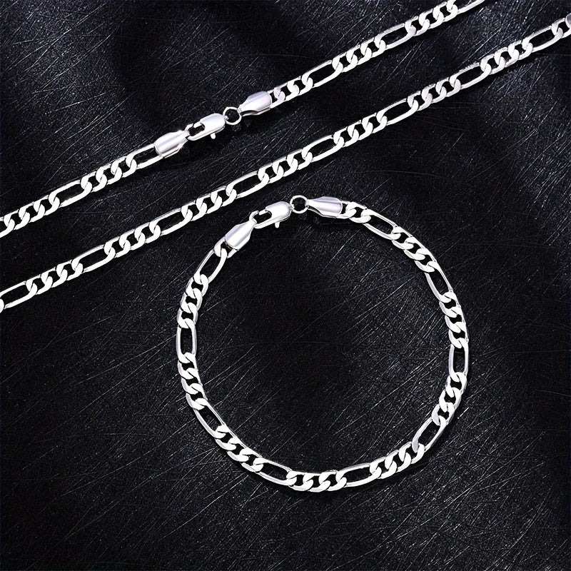 Elegante e versatile set di collana e bracciale Fegaro in argento 925, adatto sia a uomini che a donne, con bassa allergenicità. Perfetto per abbigliamento casual, hip-hop, punk, sport, feste e come regalo per le vacanze. Confezionato in un'adorabile conf
