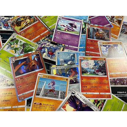 50 Carte Pokémon Giapponesi degli Ultimi Set + 2 Carte Olografiche Glitterate