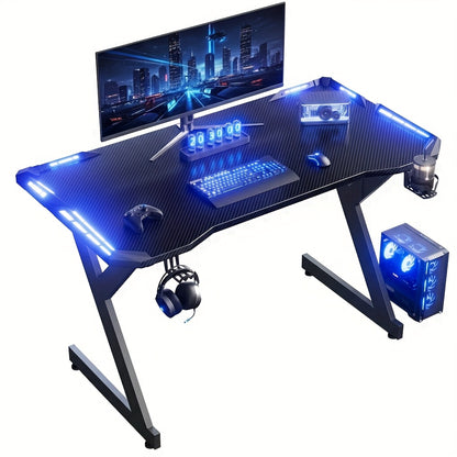 Scrivania da Gaming a Forma di Y con Luci LED RGB, Superficie in Fibra di Carbonio, Tavolo per Computer Ergonomico con Portabicchieri e Gancio per Cuffie, Postazione di Lavoro per Gamer, Ideale per Setup pz in Camera da Letto, Regalo di Natale, Compleanno