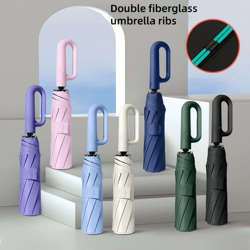 Ombrello pieghevole automatico con fibbia ad anello rotante, design elegante con rinforzo in fibra di vetro per resistenza al vento, in tessuto di alta qualità e con manico per una facile apertura con una sola mano. Il suo stile minimalista lo rende un re