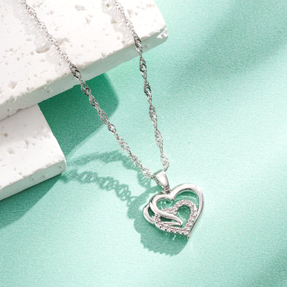 Collana pendente elegante in argento 925 per donna, con catena a onda unica e pendente a cuore in Zirconia sintetica scintillante, regalo perfetto per le feste e per le donne, confezionato in scatola regalo