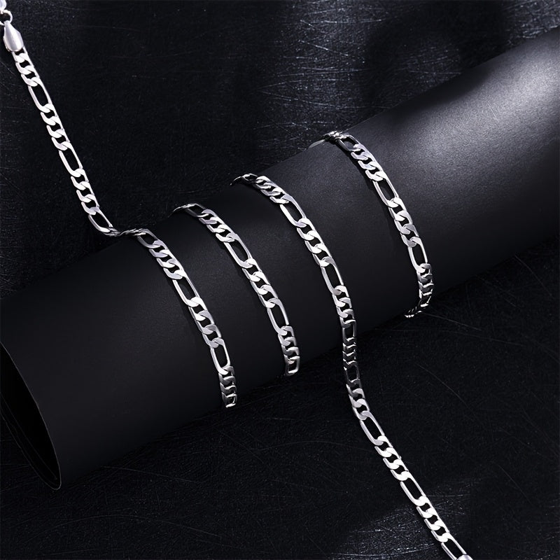 Elegante e versatile set di collana e bracciale Fegaro in argento 925, adatto sia a uomini che a donne, con bassa allergenicità. Perfetto per abbigliamento casual, hip-hop, punk, sport, feste e come regalo per le vacanze. Confezionato in un'adorabile conf