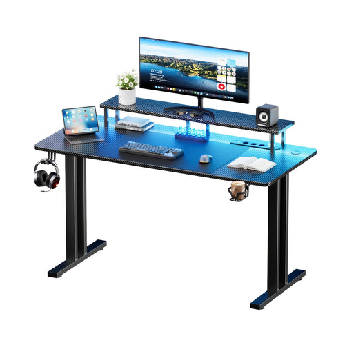 Scrivania Gaming RGB LED con Prese Elettriche e Supporto per Monitor, Postazione Ergonomica per Computer, Ampio Piano in Fibra di Carbonio per Ufficio Domestico con Portabicchieri e Gancio per Cuffie, Nero